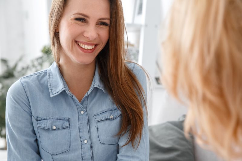 pleasnt woman in room with doctor 800